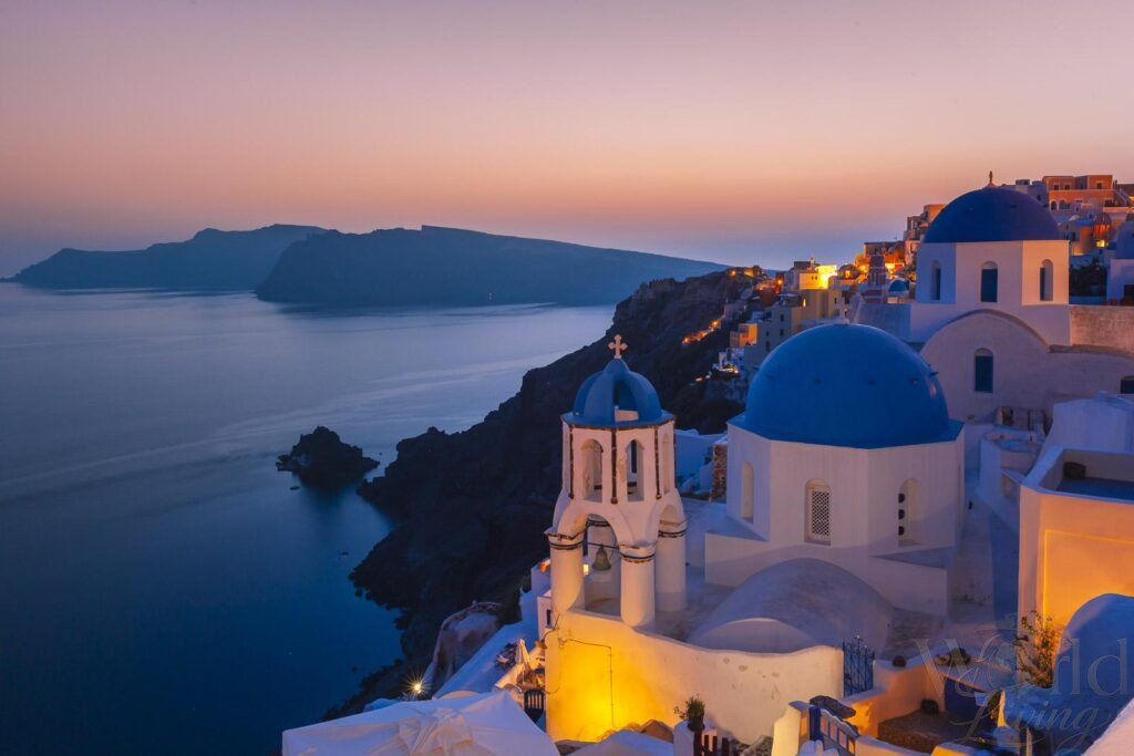 10 Life Changing Destinations 11 life changing destination Santorini white buildings blue domes and sea view