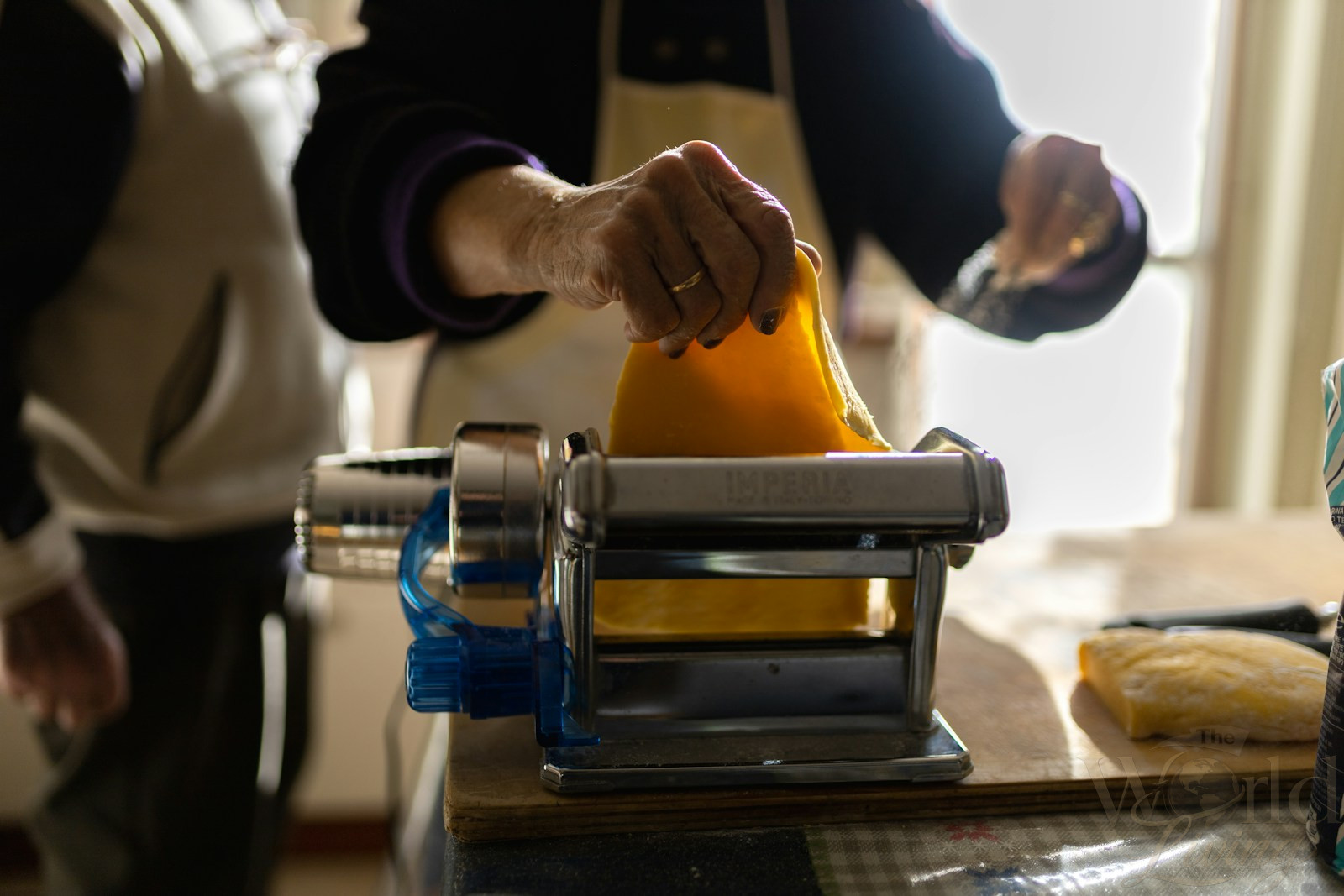 The Ultimate Destination Guide for Experiential Travelers 2 Learning to make pasta from scratch in a Tuscan cooking class.