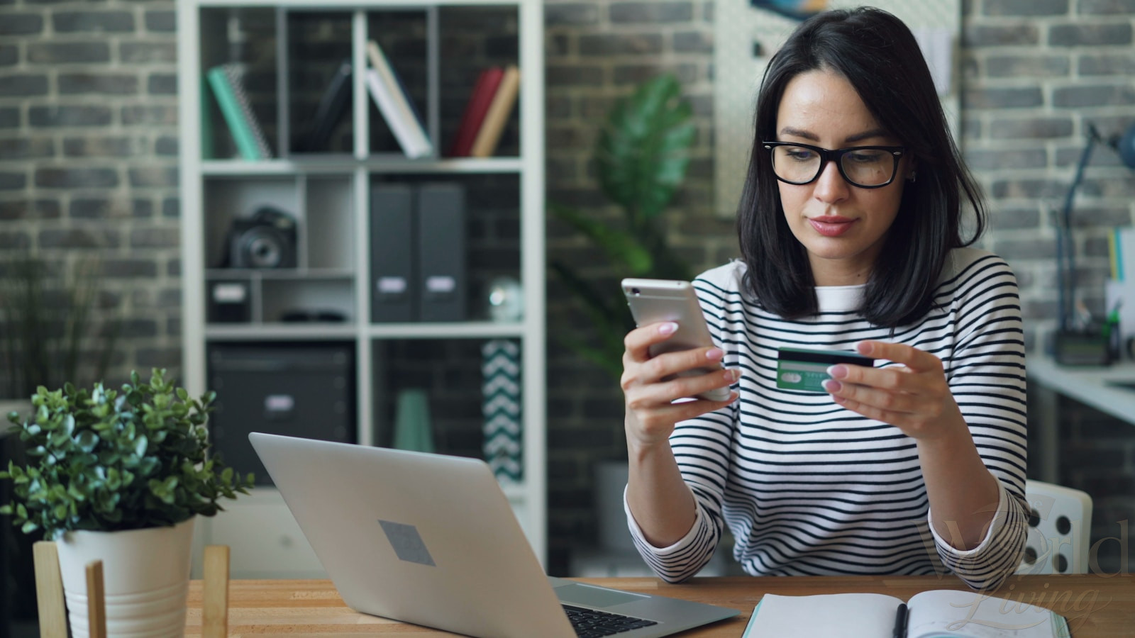 The Best Time to Travel for Lower Costs and Fewer Crowds 3 a woman sitting at a table looking at her cell phone