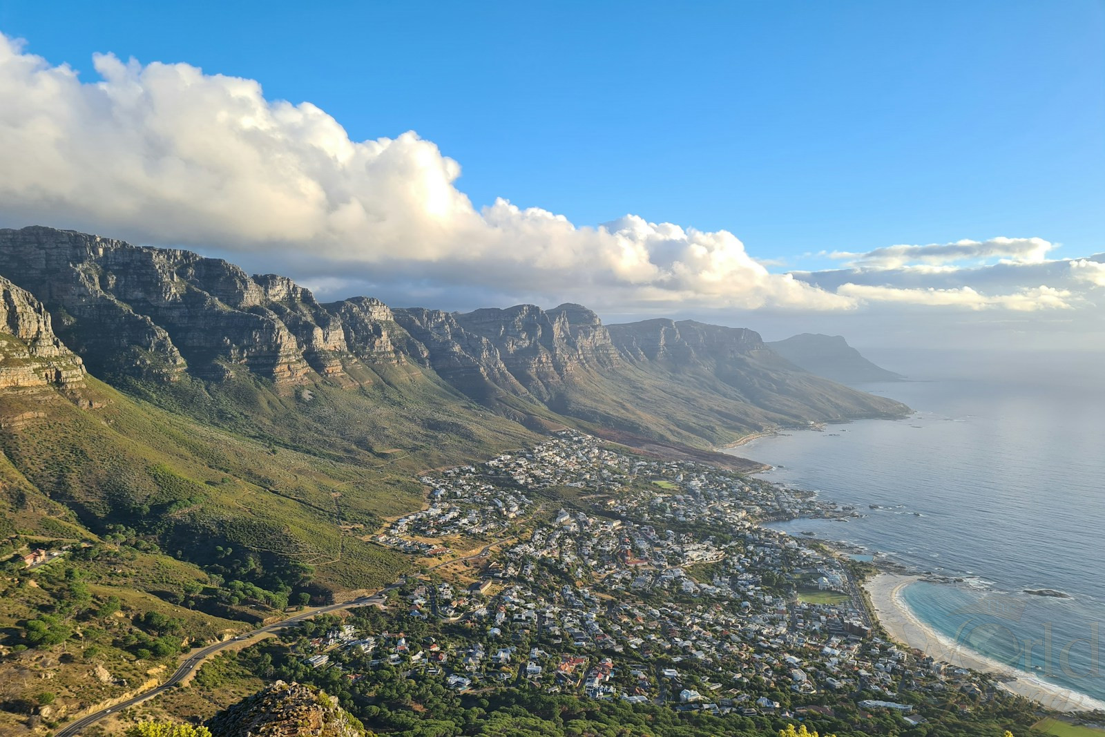 A 6-Day South Africa Safari and City Itinerary 4 South Africa Safari. aerial view of green and brown mountains under blue sky during daytime